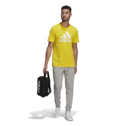 Adidas Essentials French Terry Tapered Cuff 3-Streifen Hose 10639898 -Kleiderliebe Laden GK8889 6 APPAREL On Model Standard Outfit View white